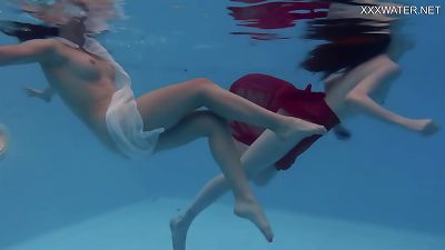 Anastasia Ocean and Marfa are bare underwater