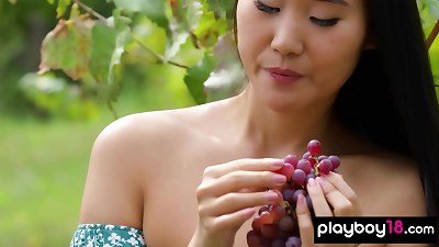 tiny titted chinese hottie Katana Storm stripping at a vineyard outdoor